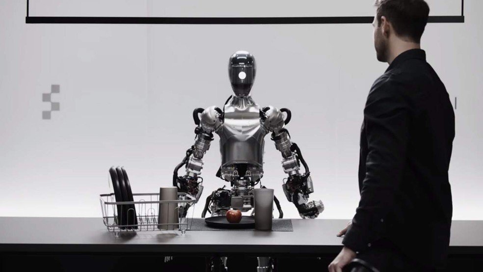Robô da Figure AI carrega roupa na lavadora e confirma salto da automação - Imagem do artigo original